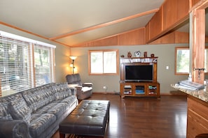 Flat-screen TV, DVD player, ping pong, books