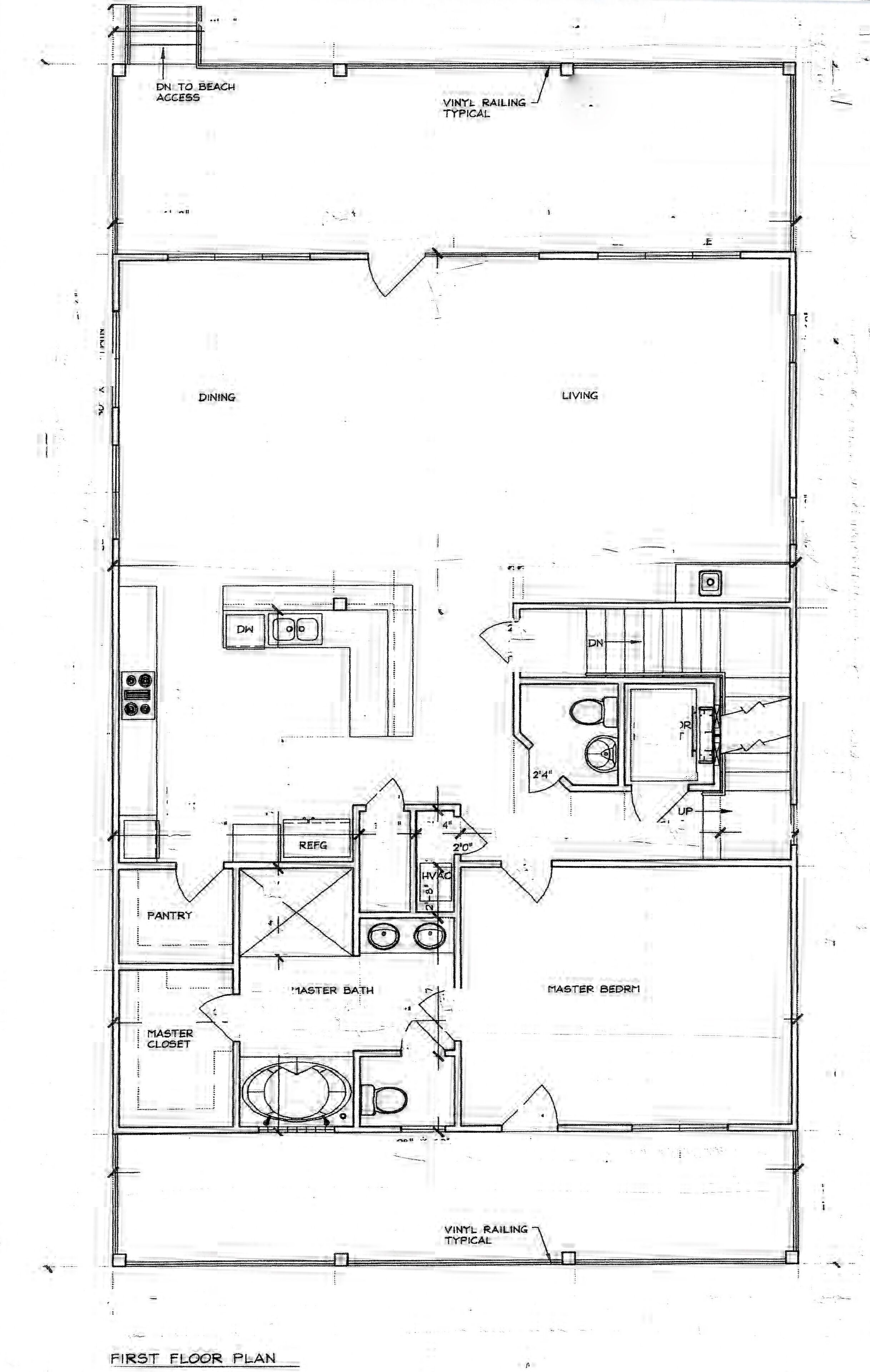 Un plan du premier étage comprenant un coin repas, un salon, une cuisine, une chambre principale et une salle de bain principale.