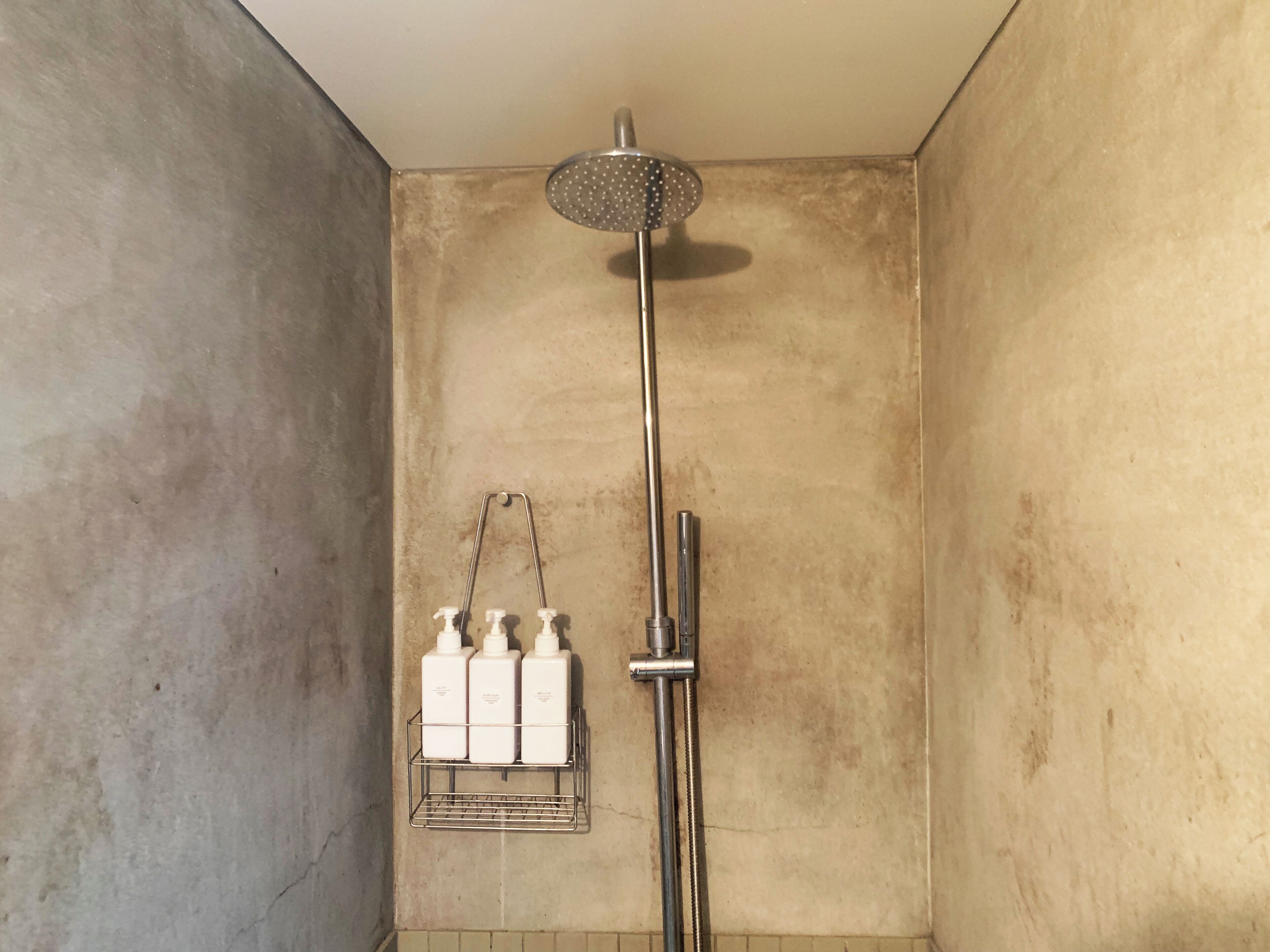 Shower, hair dryer, towels, shampoo