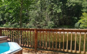 Outdoor spa tub - Historic Riverside Log Cabin - Stay Waterfront! (Elkins)