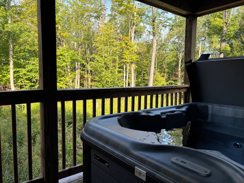 Six bedroom home with a hot tub, pool and an outdoor bar on a two acre lot.