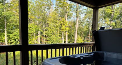 Six bedroom home with a hot tub, pool and an outdoor bar on a two acre lot.