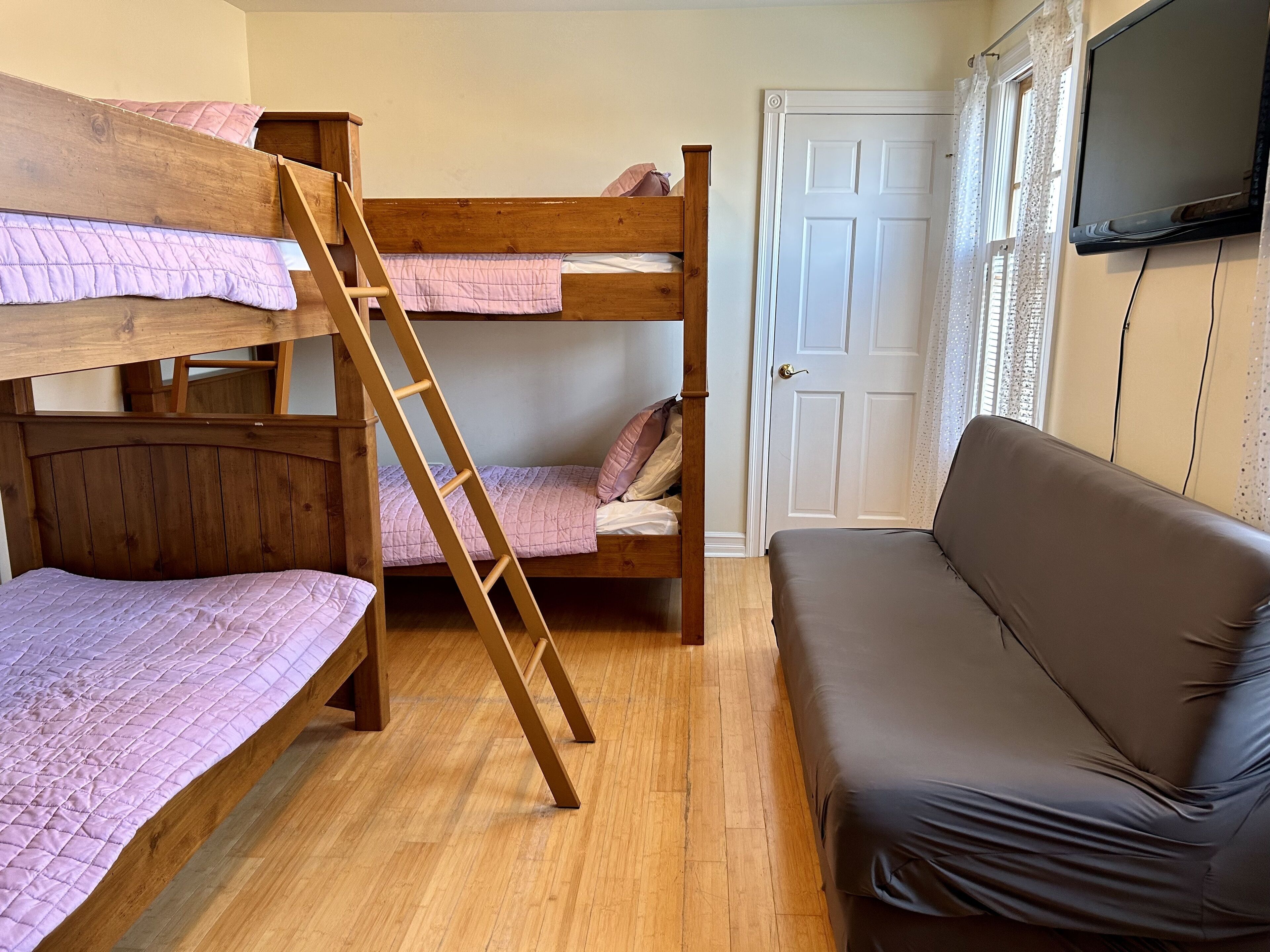 Bedroom 5 (4 Twin Sized Beds and a folding couch)