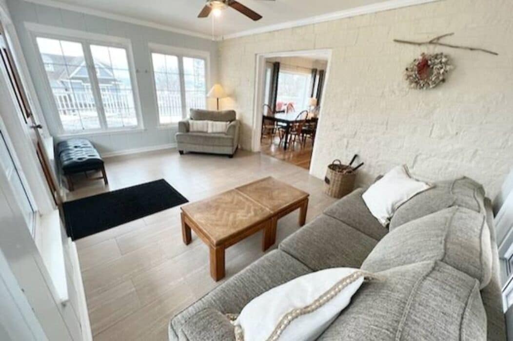 View of the lake from 2 decks in this 6BR Lake Shore Dr home, steps to the beach