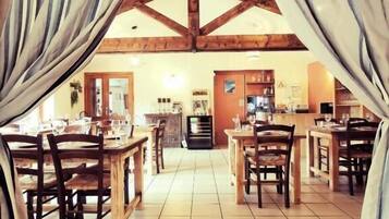 Breakfast, lunch, dinner served; local cuisine