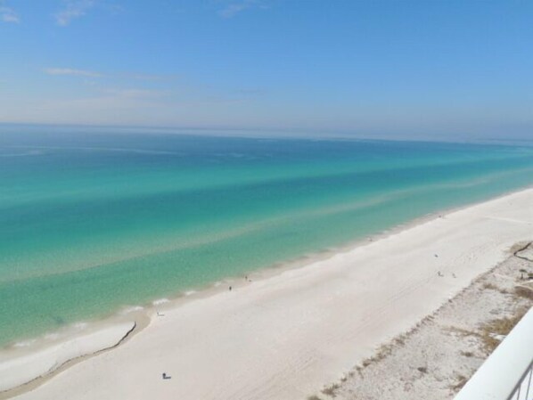 Enjoy a serene beach experience with breathtaking ocean views and access to the sandy shore.