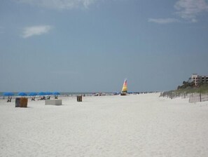 On the beach, sun loungers