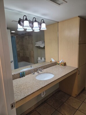 Bathtub, jetted tub, hair dryer, towels