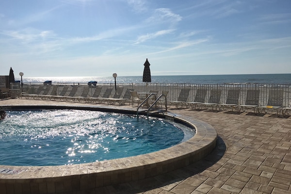 Beachside pool at Sand Castle 3 - perfect for relaxing on your vacation!