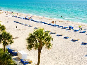 On the beach, sun-loungers, beach towels