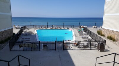 Beachfront Condo on Lake Michigan with heated pool.