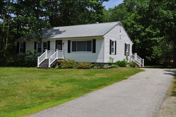 Located in a quiet wooded setting.