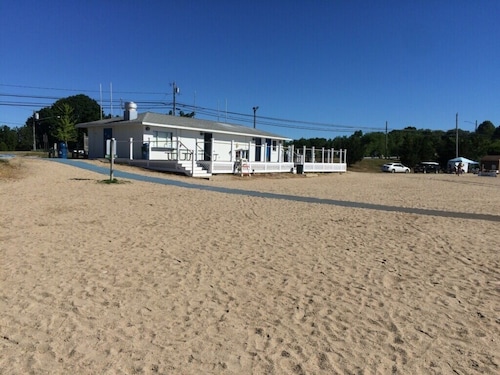 A peaceful nature setting within a two minute drive to Historic Downtown Mystic.