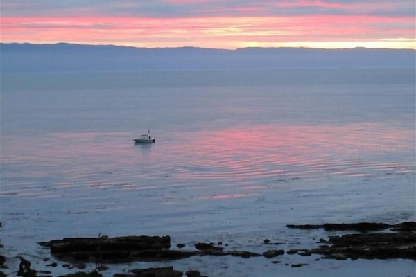 Rise early to see a spectacular sunrise - taken in front of Sea Shell