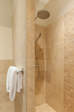 Bathtub, hair dryer, towels, soap