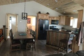 Open Kitchen and Dining with bar space