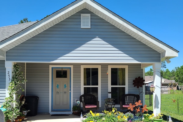 Front door is your entrance you get one side of driveway