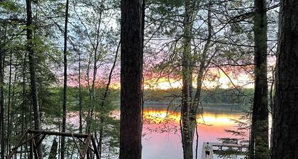 ExecLogHome~Bass Lk~4BR+Lft/3.5BA~Sauna/Game+TheaterRm/Bar/Row Boat/Pier w/Elec