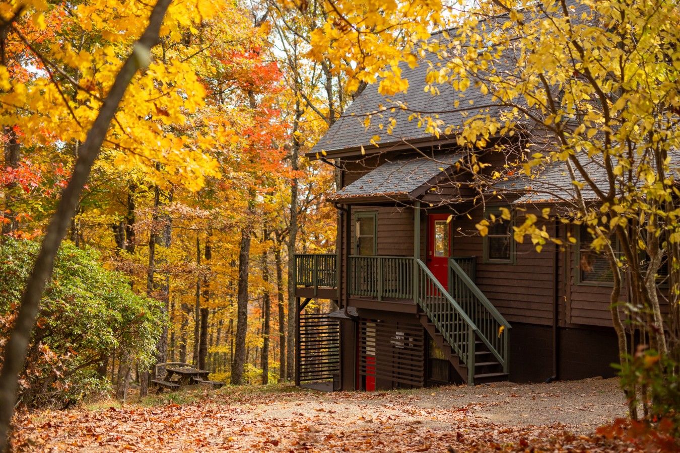 Welcome to Ridgetop Cabin! View of the cabin as you drive up. Enter through the red door at the top of the stairs.