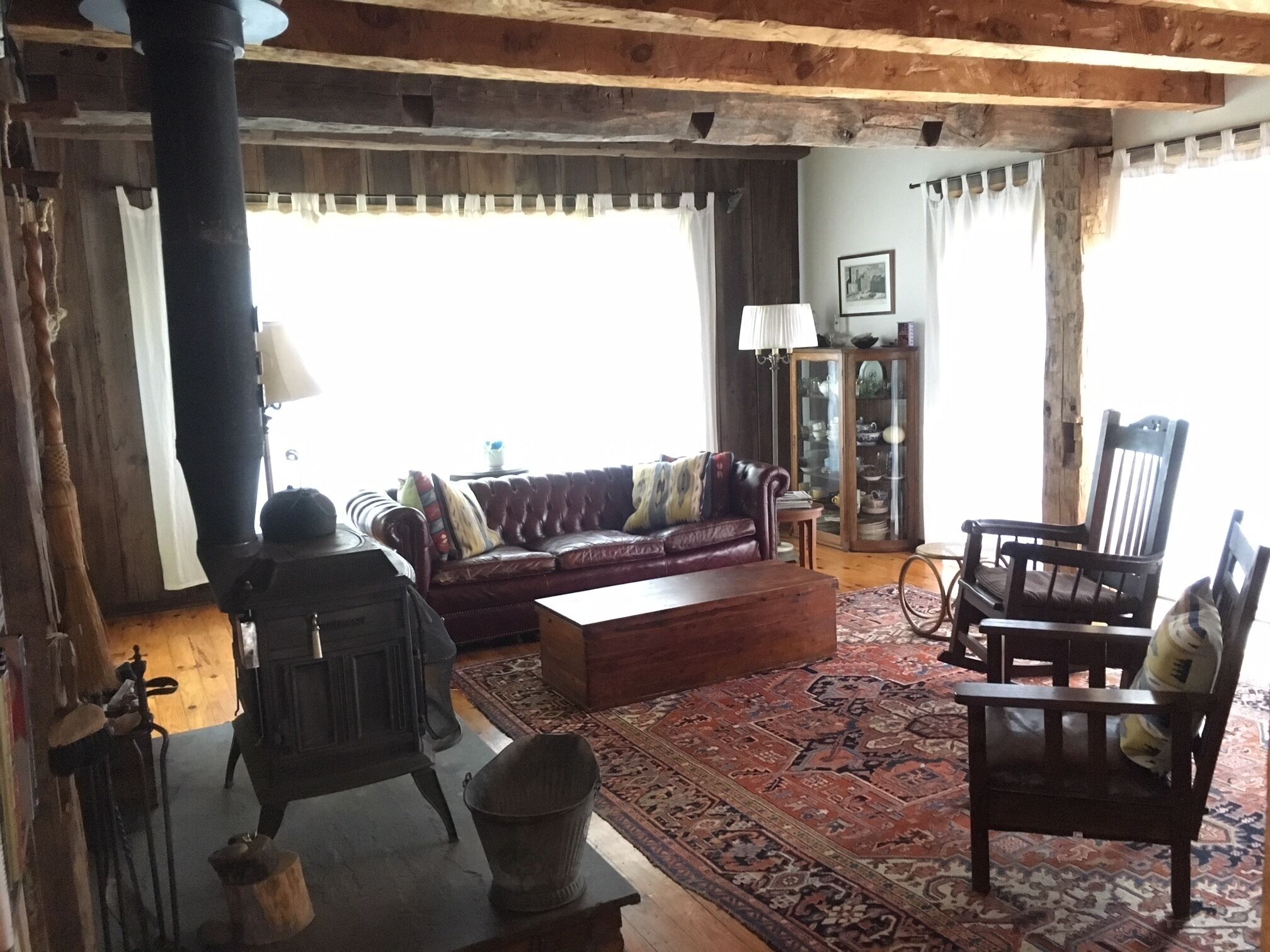 Stunning, Secluded Log Home Surrounded by Woods and Water