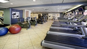 A gym with multiple treadmills, stationary bikes, and exercise balls. - Two-Bedroom Villa at Westgate Vacation Villas Resort just One Mile from DISNEY (Kissimmee)