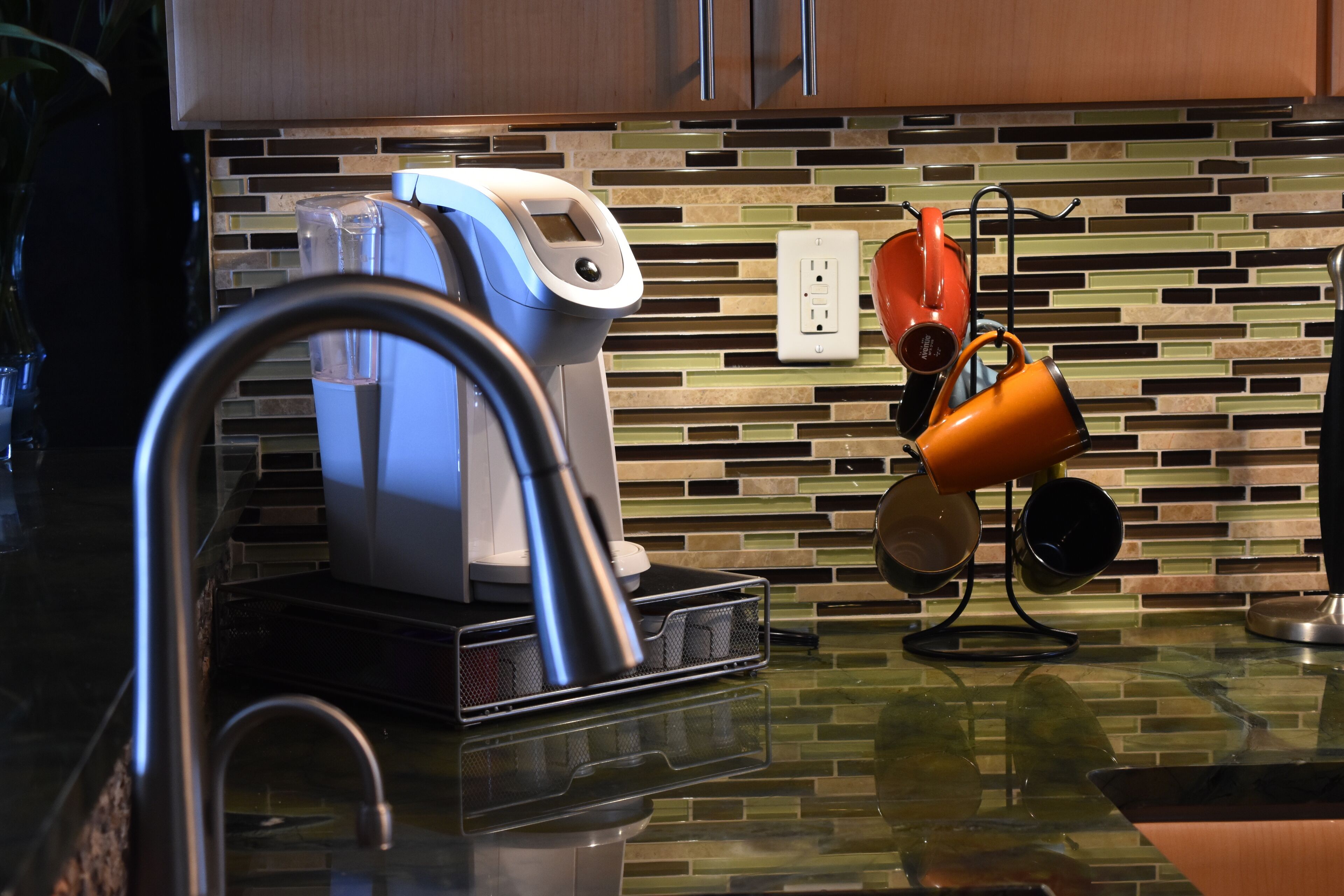 Coffee maker and sink