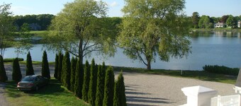 NEW LUXURY ONE-BEDROOM CONDO,  SLEEPS 4; WITH PRIVATE BALCONY AND WATER VIEWS