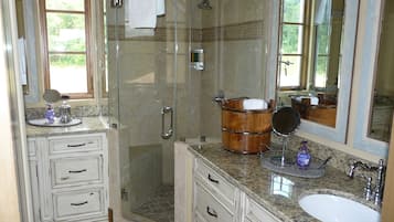 Combined shower/bathtub, hair dryer, towels, soap
