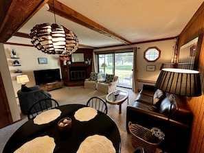 Smart TV, fireplace, DVD player, books