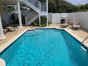 Private pool area with grill