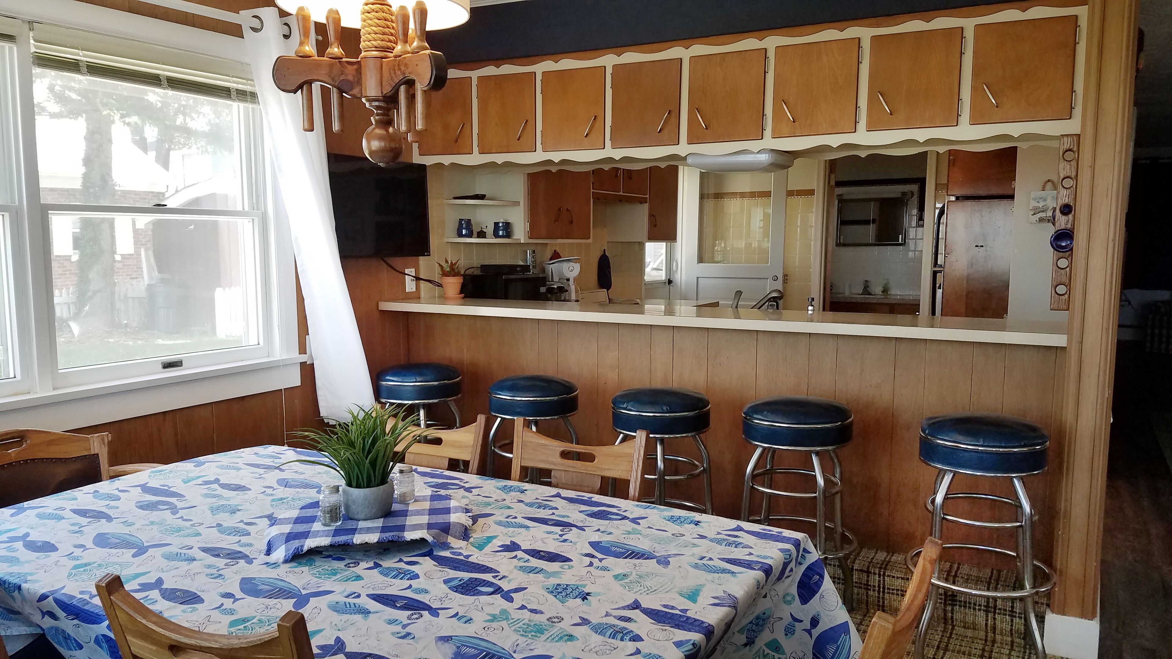 Lake Front Nautical Themed Home with Private Yard & Sandy Bottom Water Access!