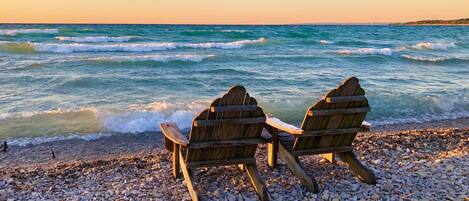 On the beach, sun-loungers, beach towels