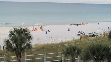 On the beach, sun-loungers