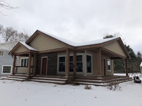 Charming cottage with views from the porch of Birch Lake near White Bear Lake Mn