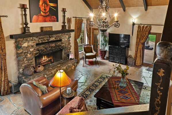 Smart TV, fireplace, foosball, books