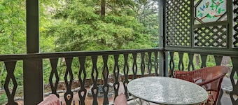 Creekside Chateau,patio overlooks Oak Creek, with steps directly to the water