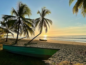 On the beach, sun loungers, beach towels