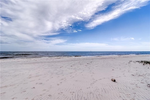 On the beach, sun-loungers, beach towels
