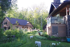 Owners home with carriage house behind