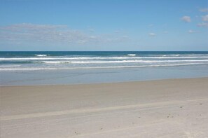 On the beach, sun loungers, beach towels