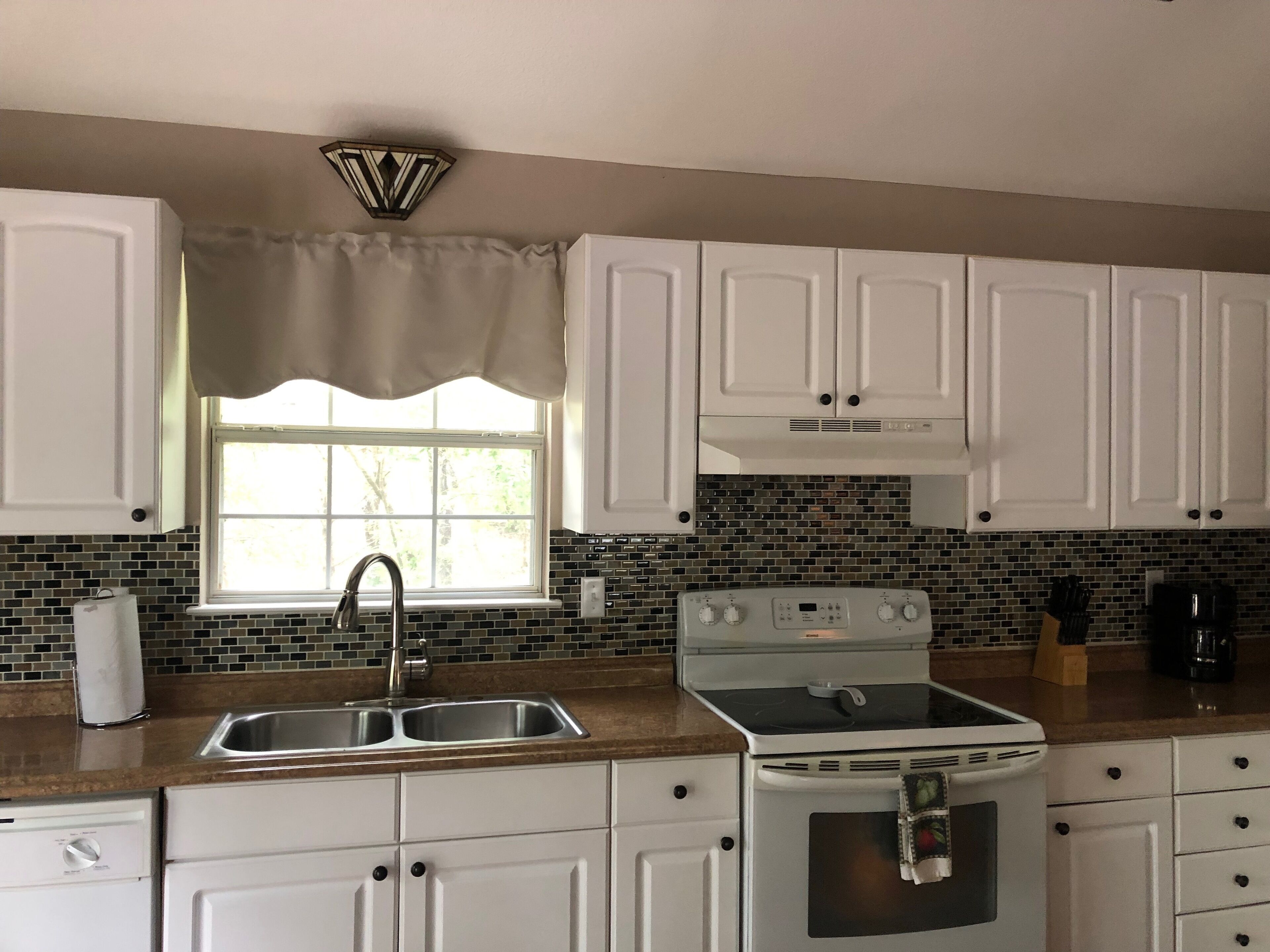 TREES AND DECKS AND TOTALLY UPDATED 2 BEDROOM COTTAGE