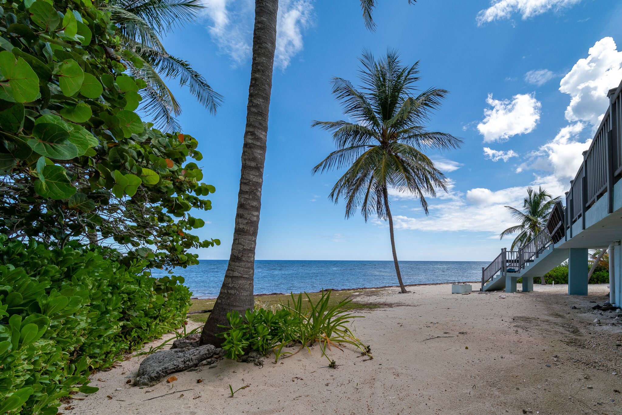 On the beach, sun loungers, beach towels