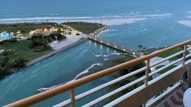 A coastal hotel with a pool, beach access, and a view of the ocean. - Oceanfront Premium 3BR- Gourmet Kitchen! Farmhouse Decor! Gorgeous View! (Myrtle Beach)
