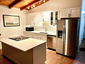 Fridge, microwave, oven, stovetop - Right on the beach, wonderful views of the ocean, great house! (Oak Island)