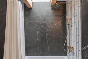 Bathtub, hair dryer, towels