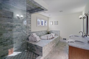 Bathtub, jetted tub, hair dryer, towels
