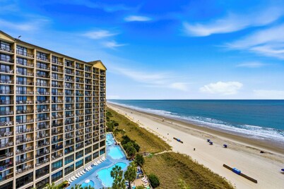 Just updated- Pretty & clean fresh oceanfront condo with pools & hot tubs!