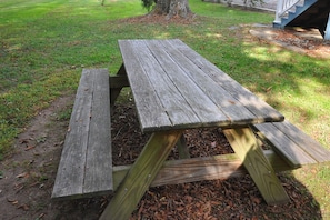 picnic table for outdoor picnic under the trees