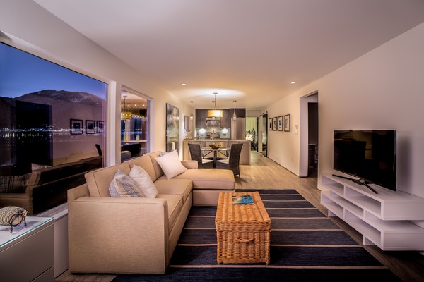 Open floor living with view of Mt Roberts and Juneau