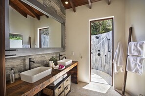 Bathtub, jetted tub, hair dryer, towels